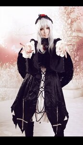 Rating: Safe Score: 0 Tags: 1girl black_dress dress flower frilled_sleeves frills gothic_lolita hairband letterboxed lolita_fashion long_hair long_sleeves looking_at_viewer outstretched_hand red_eyes rose silver_hair solo standing suigintou User: admin