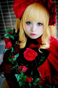 Rating: Safe Score: 0 Tags: 1girl bangs blonde_hair blue_eyes bow eyelashes flower lips long_hair looking_at_viewer red_flower red_rose rose shinku solo upper_body User: admin