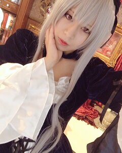 Rating: Safe Score: 0 Tags: 1girl bookshelf chin_rest jewelry lips long_hair long_sleeves looking_at_viewer red_eyes solo suigintou upper_body white_hair User: admin