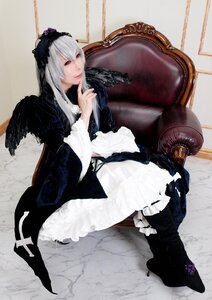 Rating: Safe Score: 0 Tags: 1girl boots dress flower frilled_sleeves frills hairband long_hair long_sleeves red_eyes silver_hair sitting solo suigintou wings User: admin