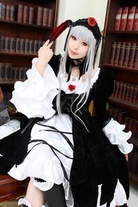 Rating: Safe Score: 0 Tags: 1girl book bookshelf dress flower gothic_lolita hairband library lolita_fashion long_hair long_sleeves looking_at_viewer red_flower red_rose rose silver_hair sitting solo suigintou User: admin