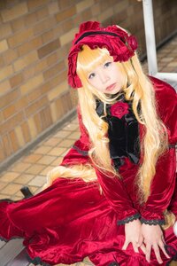 Rating: Safe Score: 0 Tags: 1girl blonde_hair blue_eyes brick_wall dress flower frills lips lolita_fashion long_hair long_sleeves looking_at_viewer pink_flower pink_rose red_capelet red_dress red_flower red_rose rose shinku sitting solo tiles User: admin