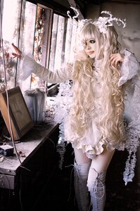 Rating: Safe Score: 0 Tags: 1girl blonde_hair blue_eyes boots frills gothic_lolita indoors kirakishou lace lips lolita_fashion long_hair solo thighhighs wavy_hair window User: admin