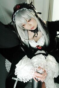 Rating: Safe Score: 0 Tags: 1girl dress frills gothic_lolita hairband lips lolita_fashion long_hair long_sleeves looking_at_viewer red_eyes rose silver_hair sitting solo suigintou User: admin