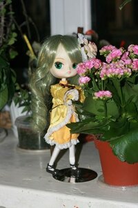 Rating: Safe Score: 0 Tags: 1girl black_footwear blurry blurry_foreground depth_of_field doll dress flower frills green_eyes green_hair kanaria long_hair long_sleeves mary_janes shoes sitting solo standing white_legwear User: admin