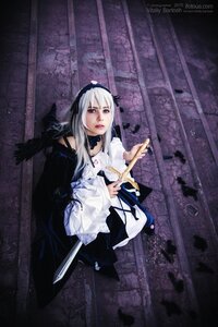 Rating: Safe Score: 0 Tags: 1girl dress frills lips long_hair silver_hair solo suigintou sword weapon wings User: admin