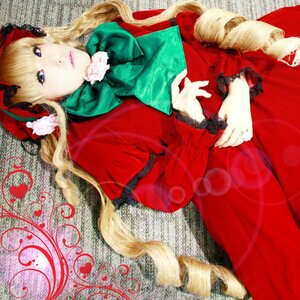 Rating: Safe Score: 0 Tags: 1girl blonde_hair blue_eyes bow capelet dress drill_hair flower green_bow lips long_hair long_sleeves lying red_dress ring shinku solo User: admin