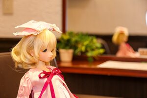 Rating: Safe Score: 0 Tags: 1girl bangs blonde_hair blue_eyes blurry blurry_background blurry_foreground depth_of_field doll hinaichigo indoors photo red_ribbon ribbon solo upper_body User: admin