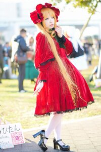 Rating: Safe Score: 0 Tags: 1girl black_footwear blonde_hair blue_eyes blurry blurry_background blurry_foreground bonnet bow depth_of_field dress flower high_heels long_hair looking_at_viewer photo red_dress shinku shoes solo standing white_legwear User: admin