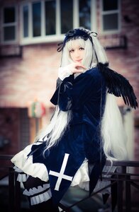 Rating: Safe Score: 0 Tags: 1girl 3d black_ribbon black_wings blurry blurry_background blurry_foreground depth_of_field dress feathered_wings feathers frills gothic_lolita hairband lolita_fashion lolita_hairband long_hair long_sleeves looking_at_viewer photo ribbon silver_hair sitting solo suigintou wings User: admin