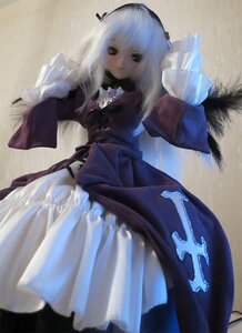 Rating: Safe Score: 0 Tags: 1girl black_dress doll dress frills long_hair long_sleeves looking_at_viewer photo ribbon solo standing suigintou User: admin