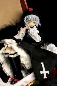 Rating: Safe Score: 0 Tags: 1girl bangs black_dress blunt_bangs doll dress flower frills gothic_lolita hairband lolita_fashion long_sleeves looking_at_viewer red_eyes red_flower red_rose rose silver_hair sitting smile solo suigintou User: admin