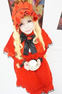 Rating: Safe Score: 0 Tags: 1girl blonde_hair blue_eyes capelet dress flower holding long_hair looking_at_viewer red_capelet red_dress shinku solo User: admin