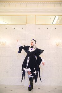 Rating: Safe Score: 0 Tags: 1girl black_dress boots dress long_sleeves solo standing suigintou wings User: admin