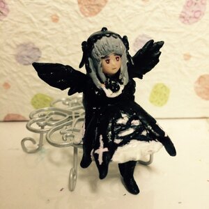 Rating: Safe Score: 0 Tags: 1girl bangs black_dress blunt_bangs boots closed_mouth doll dress feathers full_body long_sleeves looking_at_viewer solo standing suigintou wings User: admin