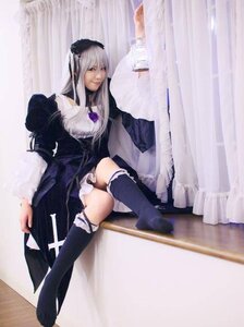 Rating: Safe Score: 0 Tags: 1girl curtains doll_joints dress frills hairband long_hair long_sleeves silver_hair sitting solo suigintou User: admin