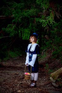 Rating: Safe Score: 0 Tags: 1boy 1girl blue_headwear brown_hair capelet hat long_sleeves nature outdoors shoes solo souseiseki standing tree white_legwear User: admin