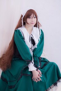 Rating: Safe Score: 0 Tags: 1girl brown_hair dress green_dress lips long_hair long_sleeves looking_at_viewer sitting solo suiseiseki v_arms very_long_hair User: admin