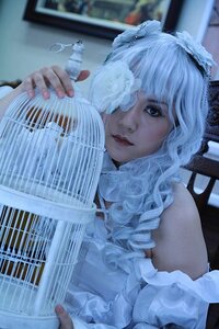Rating: Safe Score: 0 Tags: 1girl bare_shoulders birdcage blue_eyes blurry blurry_background blurry_foreground cage curly_hair depth_of_field dress electric_fan hair_over_one_eye indoors instrument kirakishou lips looking_at_viewer motion_blur photo solo upper_body white_hair User: admin