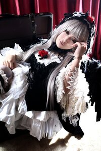 Rating: Safe Score: 0 Tags: 1girl bangs blunt_bangs dress flower frilled_sleeves frills fur_trim gothic_lolita lips lolita_fashion long_hair long_sleeves looking_at_viewer red_eyes rose smile solo suigintou User: admin