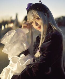 Rating: Safe Score: 0 Tags: 1girl bangs blonde_hair blurry blurry_background depth_of_field dress flower lips long_hair long_sleeves looking_at_viewer red_eyes red_lips solo suigintou tongue upper_body User: admin