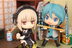 Rating: Safe Score: 0 Tags: 2girls black_dress blonde_hair blurry blurry_background blurry_foreground bottle chibi crossover depth_of_field doll dress hatsune_miku long_hair multiple_girls open_mouth photo red_eyes sitting solo suigintou thighhighs twintails very_long_hair User: admin