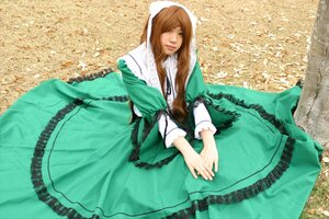 Rating: Safe Score: 0 Tags: 1girl brown_hair dress frills green_dress long_hair long_sleeves own_hands_together sitting solo suiseiseki User: admin