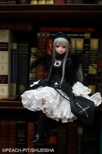 Rating: Safe Score: 0 Tags: 1girl bangs black_dress blunt_bangs book bookshelf doll dress frills gothic_lolita lolita_fashion long_hair long_sleeves sitting solo suigintou User: admin