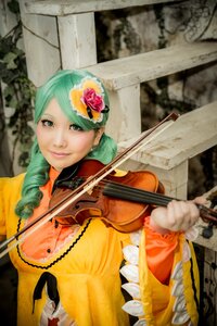 Rating: Safe Score: 0 Tags: 1girl drill_hair flower green_hair hair_flower hair_ornament instrument kanaria music musical_note photo playing_instrument solo violin User: admin