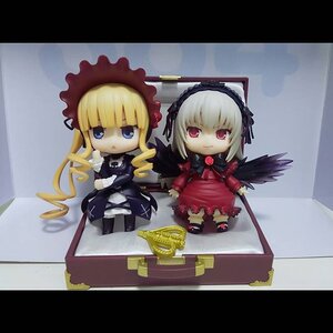 Rating: Safe Score: 0 Tags: 2girls black_wings blonde_hair blue_eyes bonnet chibi doll dress drill_hair letterboxed long_hair looking_at_viewer multiple_dolls multiple_girls red_eyes shinku sitting tagme wings User: admin