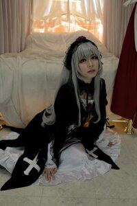 Rating: Safe Score: 0 Tags: 1girl curtains dress flower frills lips long_hair long_sleeves looking_at_viewer rose silver_hair sitting solo suigintou User: admin