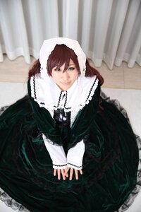 Rating: Safe Score: 0 Tags: 1girl black_dress blurry brown_hair depth_of_field dress frills heterochromia lips long_hair long_sleeves looking_at_viewer photo sitting smile solo suiseiseki v_arms User: admin