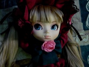 Rating: Safe Score: 0 Tags: 1girl bangs blonde_hair blue_eyes bow doll dress flower hair_bow long_hair looking_at_viewer pink_rose rose shinku solo upper_body User: admin