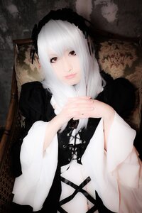 Rating: Safe Score: 0 Tags: 1girl 3d bangs closed_mouth hairband lips long_sleeves looking_at_viewer own_hands_together red_eyes solo suigintou upper_body User: admin