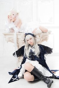 Rating: Safe Score: 0 Tags: 1girl boots dress long_hair multiple_cosplay ribbon sitting tagme white_hair wings User: admin