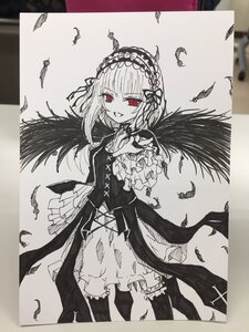 Rating: Safe Score: 0 Tags: 1girl black_feathers dress feathered_wings feathers frilled_hairband frills gothic_lolita greyscale hairband image lolita_fashion lolita_hairband long_sleeves looking_at_viewer monochrome open_mouth photo red_eyes smile solo suigintou traditional_media white_feathers wings User: admin