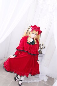 Rating: Safe Score: 0 Tags: 1girl bangs blonde_hair blue_eyes bow dress flower long_hair long_sleeves pantyhose red_dress shinku shoes solo striped User: admin