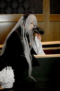 Rating: Safe Score: 0 Tags: 1girl dress holding long_hair long_sleeves solo standing suigintou very_long_hair white_hair User: admin