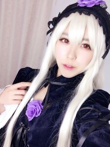 Rating: Safe Score: 0 Tags: 1girl closed_mouth dress flower hairband lips long_hair looking_at_viewer purple_flower purple_rose red_eyes ribbon rose solo suigintou white_hair User: admin