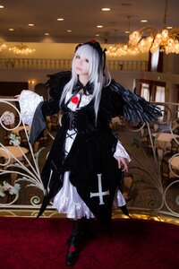 Rating: Safe Score: 0 Tags: 1girl black_dress black_footwear dress flower frills indoors long_hair long_sleeves solo standing suigintou wings User: admin