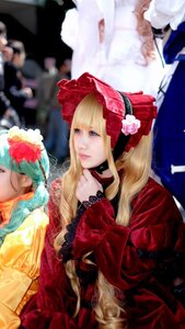 Rating: Safe Score: 0 Tags: 1girl 91076 blonde_hair blue_eyes blurry blurry_background bonnet depth_of_field dress flower frills lips long_hair multiple_cosplay photo red_dress rose shinku solo tagme User: admin