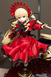 Rating: Safe Score: 0 Tags: 1girl auto_tagged blonde_hair blue_eyes bonnet bow bowtie capelet doll dress drill_hair flower long_hair long_sleeves looking_at_viewer red_dress rose shinku shoes solo standing twintails User: admin