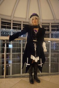 Rating: Safe Score: 0 Tags: 1girl black_footwear boots dress full_body gothic_lolita indoors long_sleeves railing solo standing suigintou User: admin