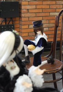 Rating: Safe Score: 0 Tags: 1girl blurry blurry_foreground boots brown_hair capelet coat depth_of_field doll dress fur_trim hat long_sleeves looking_at_viewer motion_blur multiple_dolls red_eyes short_hair sitting solo souseiseki tagme User: admin