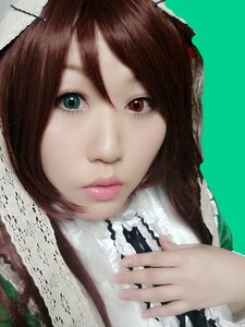Rating: Safe Score: 0 Tags: 1girl bangs brown_hair closed_mouth face fingernails gothic_lolita green_background heterochromia lips lolita_fashion looking_at_viewer simple_background solo suiseiseki User: admin