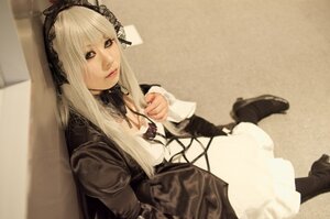 Rating: Safe Score: 0 Tags: 1girl boots dress gothic_lolita lips lolita_fashion long_hair long_sleeves looking_at_viewer ribbon sitting solo suigintou User: admin