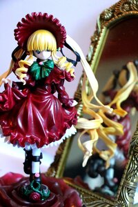 Rating: Safe Score: 0 Tags: 1girl blonde_hair blue_eyes blurry bonnet bow bowtie depth_of_field doll dress drill_hair figure frills hat long_hair long_sleeves photo red_dress shinku solo standing twintails very_long_hair User: admin