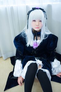 Rating: Safe Score: 0 Tags: 1girl bangs black_legwear blurry dress expressionless frills gothic_lolita hairband lips lolita_fashion long_hair long_sleeves looking_at_viewer puffy_sleeves sitting solo suigintou thighhighs User: admin