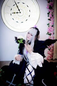 Rating: Safe Score: 0 Tags: 1girl black_dress closed_eyes dress feathers flower frills gothic_lolita hairband lips lolita_fashion long_hair long_sleeves moon realistic rose silver_hair solo suigintou wings User: admin