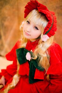 Rating: Safe Score: 0 Tags: 1girl bangs blonde_hair blue_eyes blurry blurry_background bonnet depth_of_field dress flower lips long_hair looking_at_viewer photo red_dress rose shinku smile solo User: admin